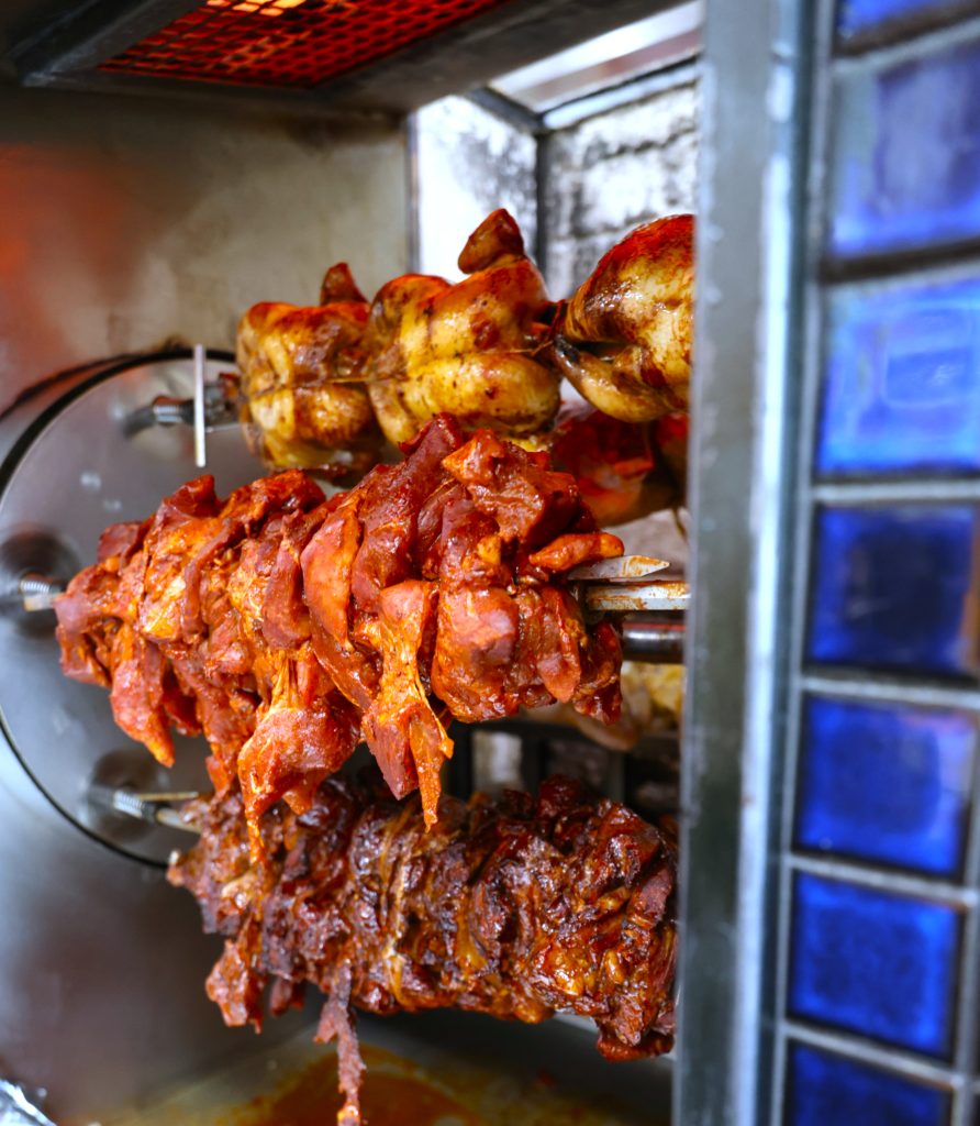 Rotisserie meats cooking